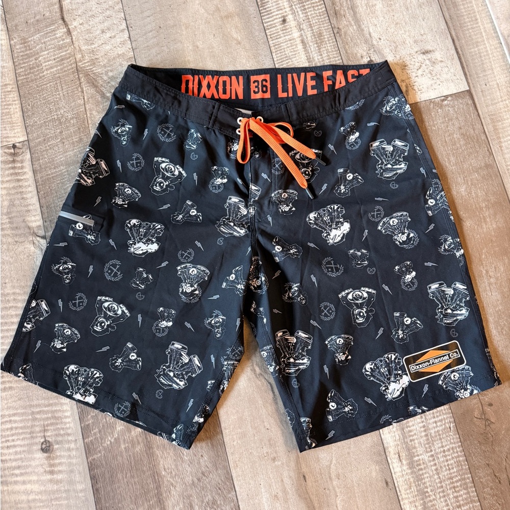 DIXXON Black Board Shorts with Orange Accents